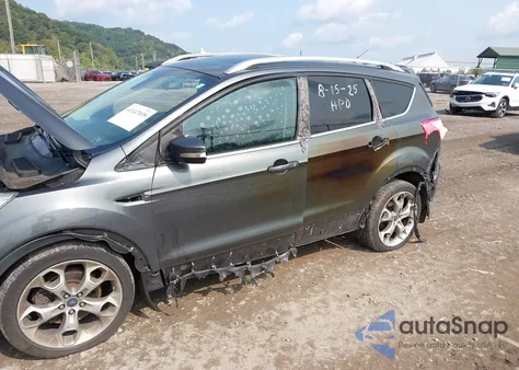 2015 Ford Escape Titanium z USA, uszkodzony, nr VIN 1FMCU9J96FUB11569